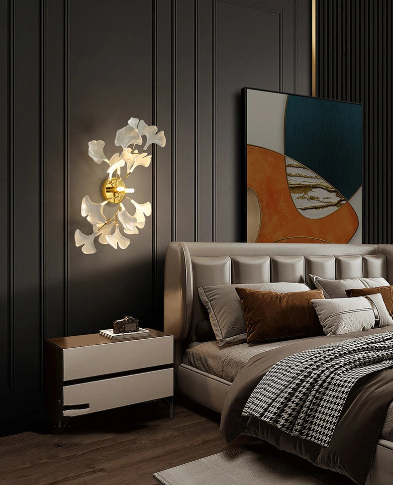 Modern bedroom with a bed, nightstand, and wall art