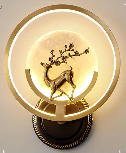 Decorative wall lamp with deer design on a gray background