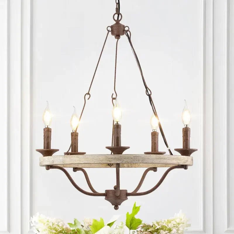 Vintage-style chandelier with five candle-like lights on a white background