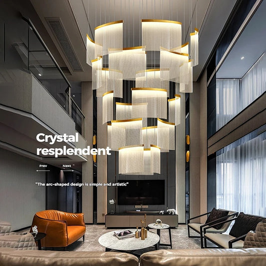 Close-up of the gold frame and crystal elements of a cascading waterfall chandelier.