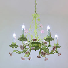 Green floral ceramic chandelier with rose and leaf accents, angled view.