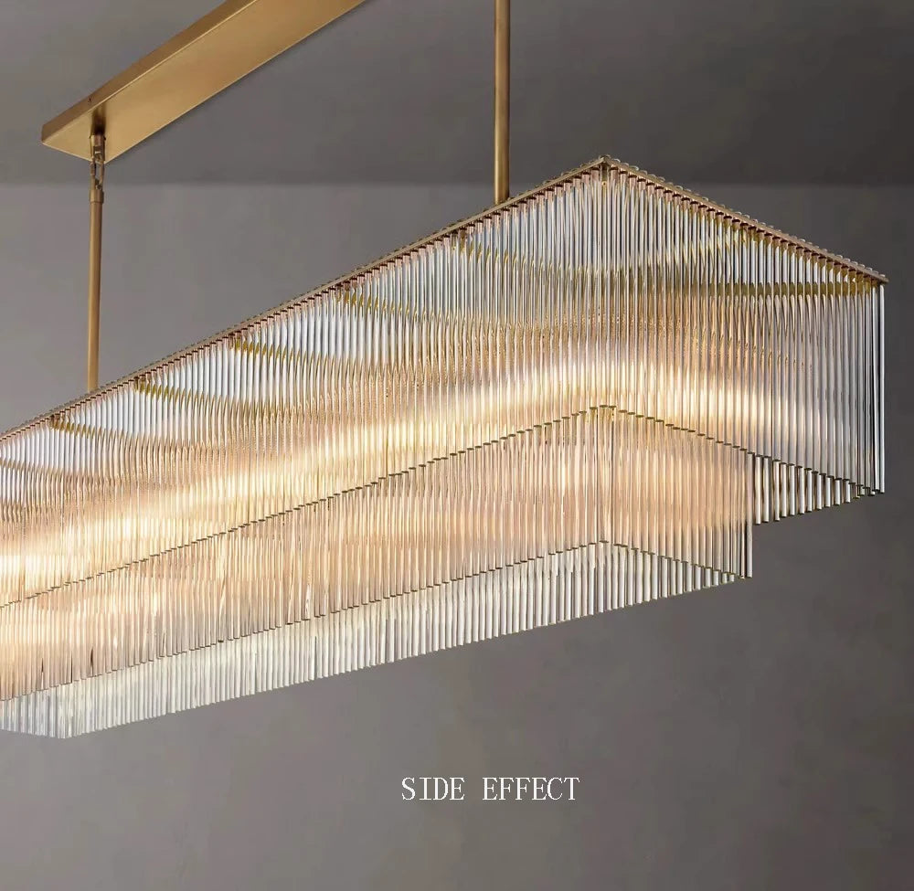 Modern rectangular pendant light with gold frame on a gray background