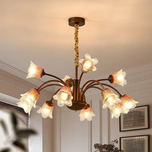 Close-up view of the bronze floral bud chandelier pendant light, highlighting the glass shades.