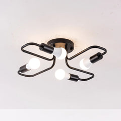 Black metal starburst semi-flush ceiling light fixture with four exposed LED bulbs