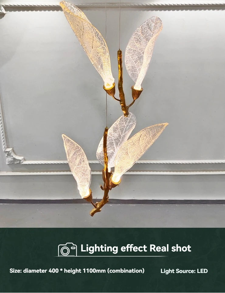 Decorative chandelier with leaf-like design on a gray background