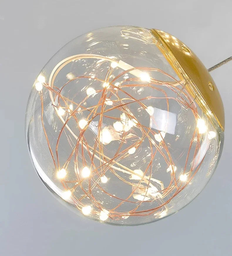 Decorative light bulb with copper wire and clear glass on a gray background