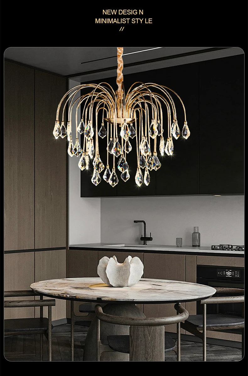 Modern kitchen with a stylish chandelier and marble table.