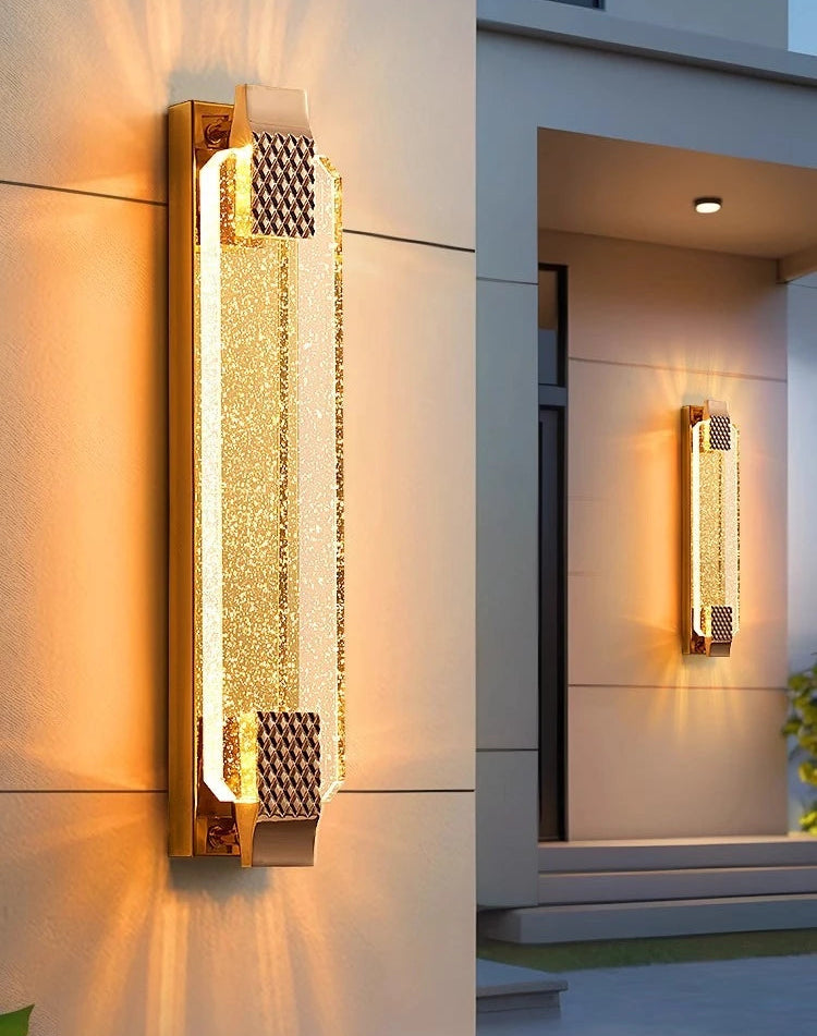 Modern wall-mounted light fixture on a building exterior