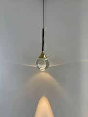 Glass Globe Pendant Light with Textured Moon Detail