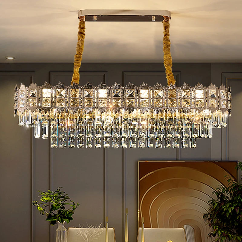 Luxurious crystal chandelier hanging in a room with decorative elements.