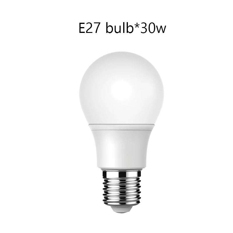 White light bulb with E27 base on a white background