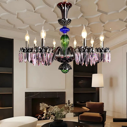A multi-colored crystal chandelier with candelabra-style arms, hanging above a fireplace in a living room.