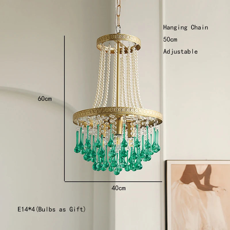 Chandelier with green glass drops on a neutral background