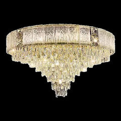 Close-up view of a gold chandelier with cascading crystals, showcasing its intricate design and reflective surfaces.
