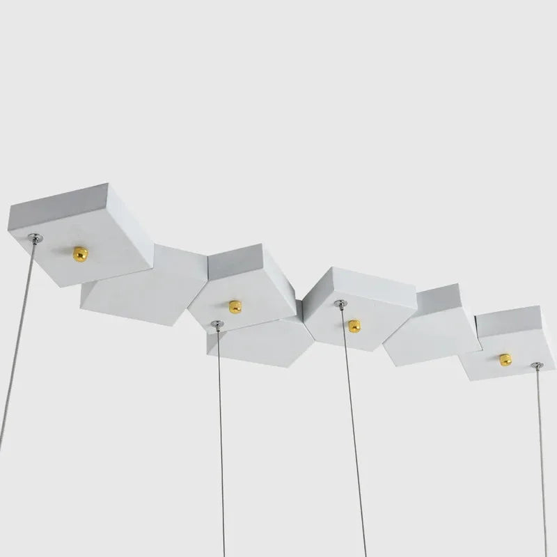 Modern ceiling light fixture with geometric design on a white background