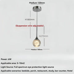 Glass Globe Pendant Light with Textured Moon Detail
