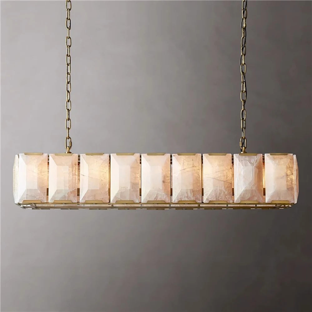 Modern pendant light with rectangular glass shades on a gray background