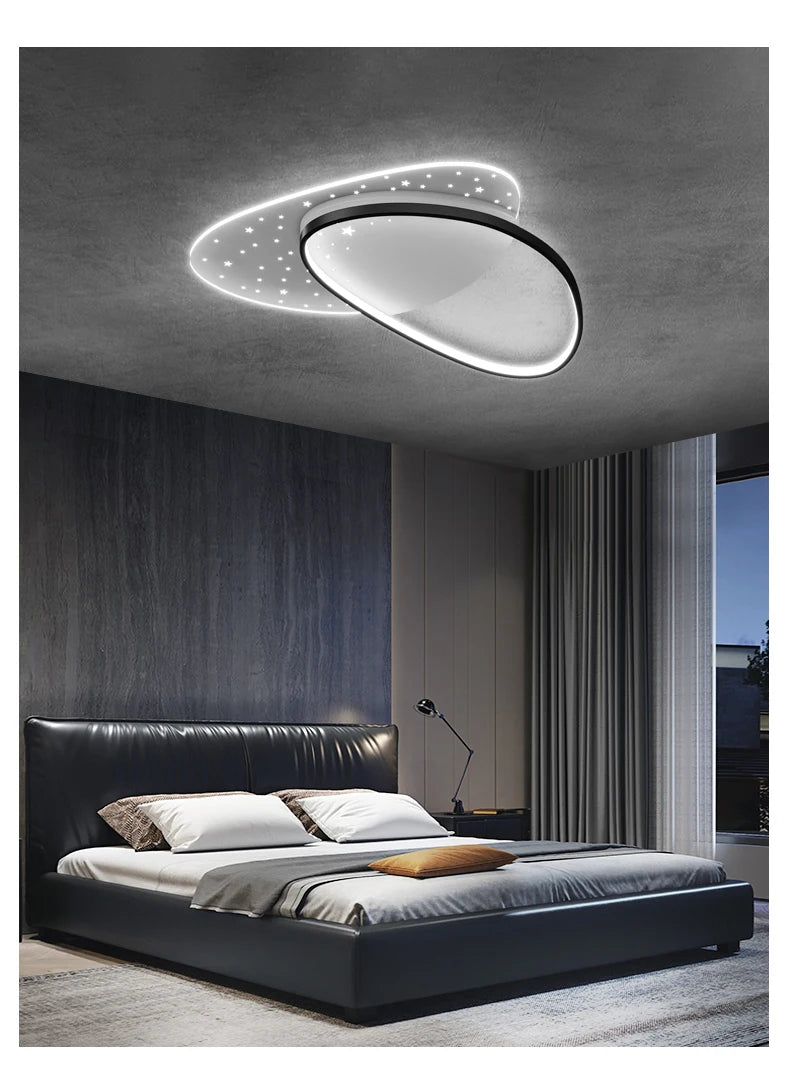 Modern bedroom with a ceiling light fixture
