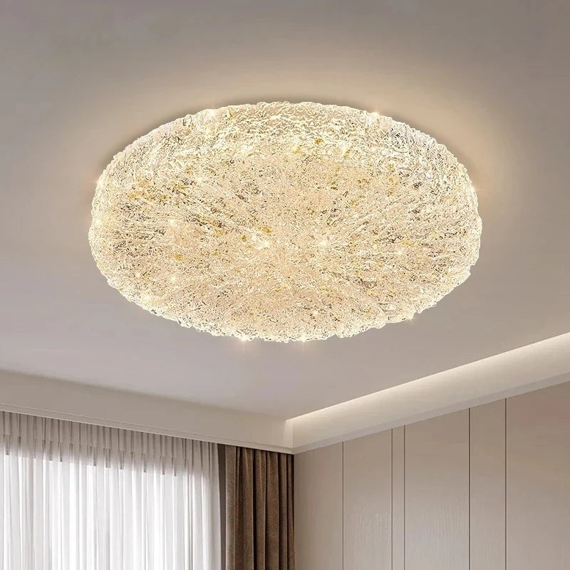 View of a gold resin textured flush mount ceiling light from an angle