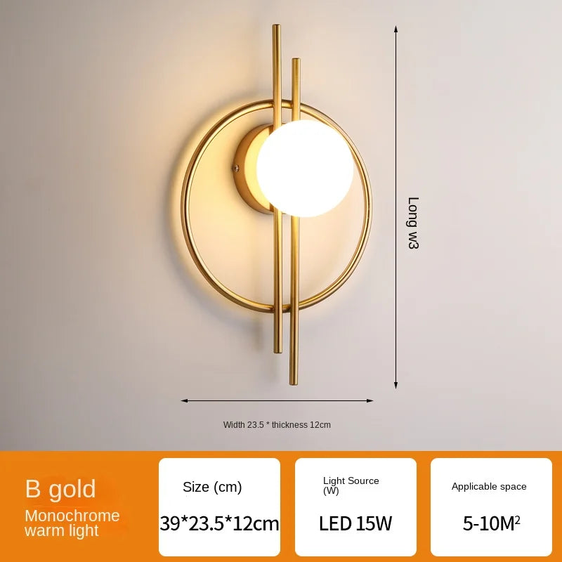 Wall-mounted light fixture with gold finish and dimensions displayed on a gray background