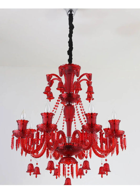 Red crystal tiered candelabra chandelier with multiple light arms and hanging crystal droplets.
