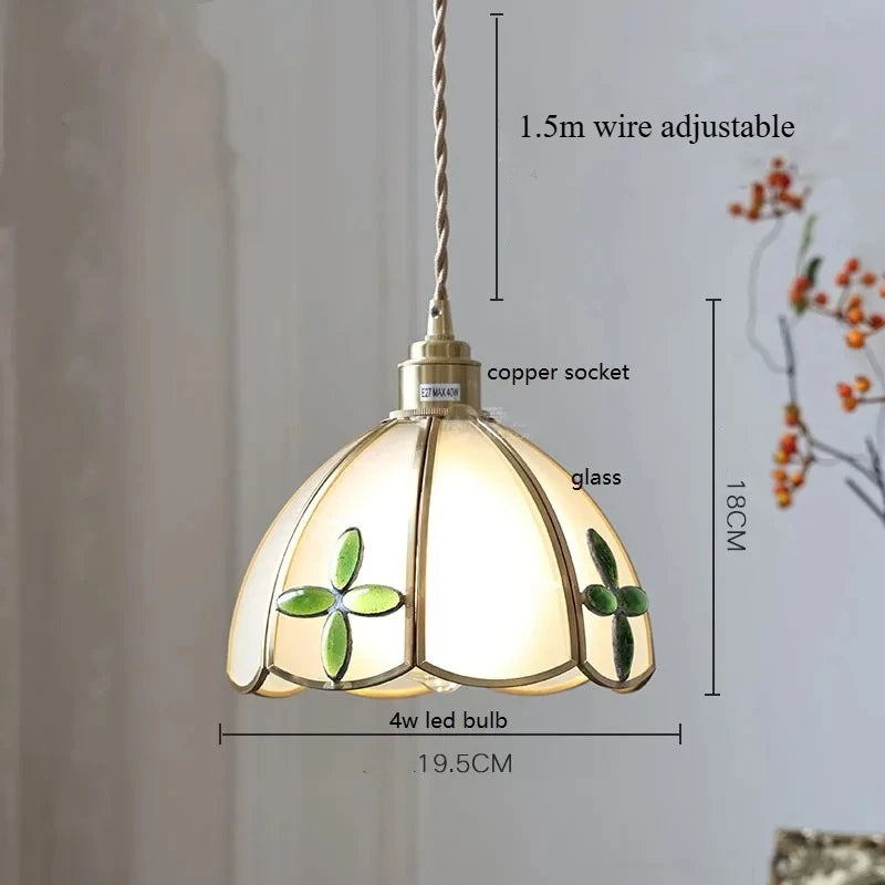 Pendant light with decorative glass shade, measurements indicated.