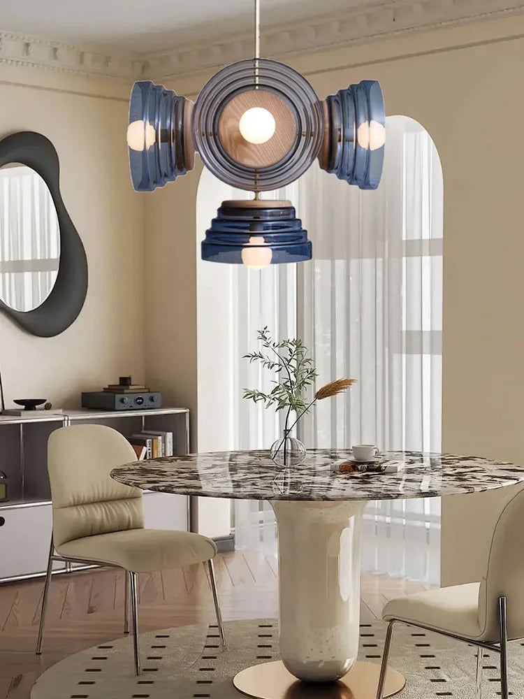 Modern dining room with a stylish pendant light fixture.