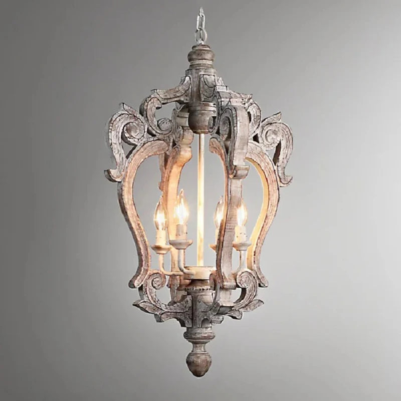 Decorative pendant light with intricate design on a gray background