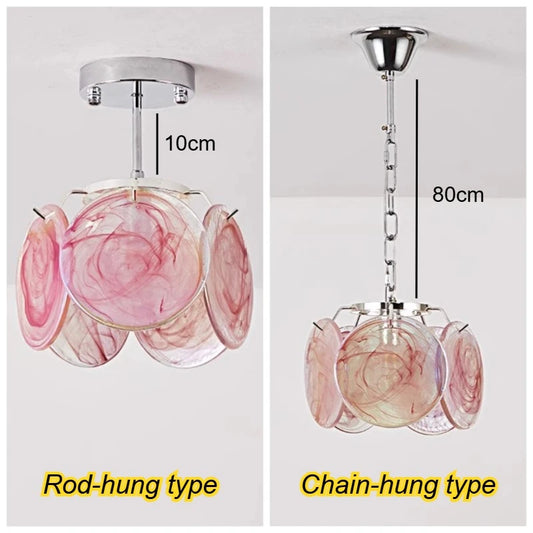 Rod-hung type floral glass pendant light in pink and white swirls, mounted close to the ceiling.