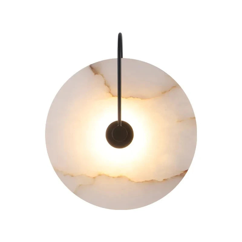 Round marble pendant light with a white background