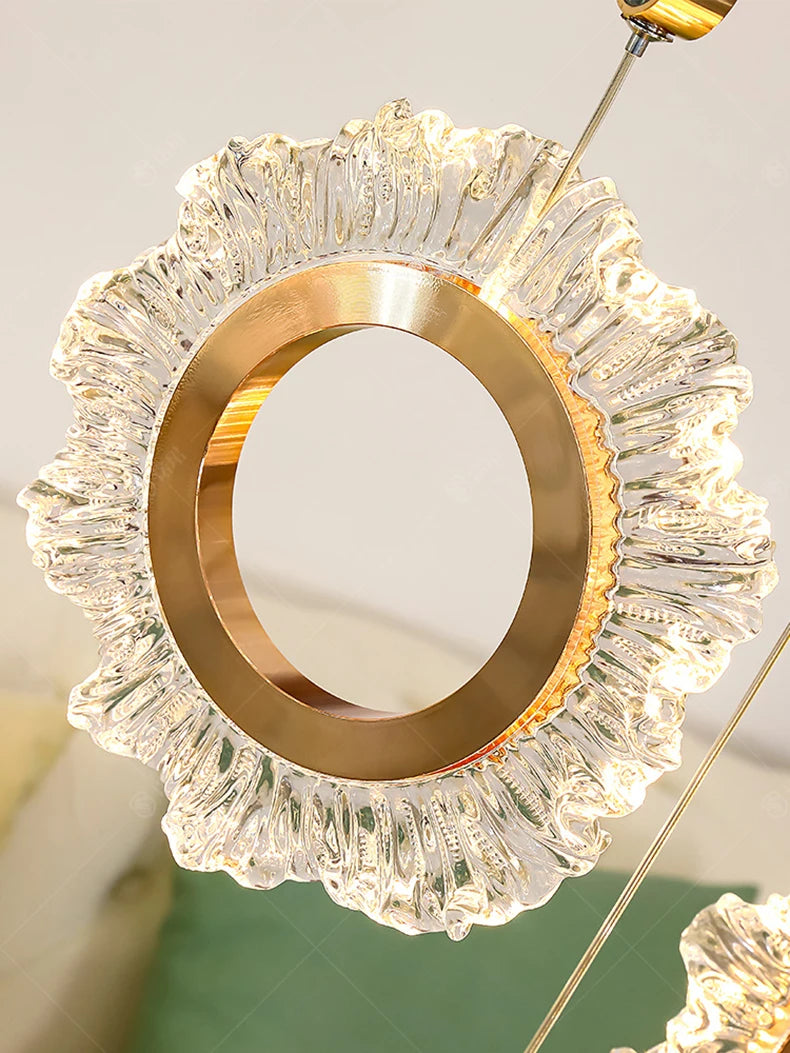 Decorative wall mirror with gold frame and crystal-like details