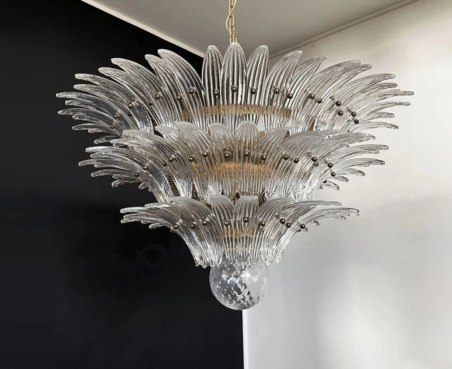 Decorative chandelier with glass elements on a black and white background