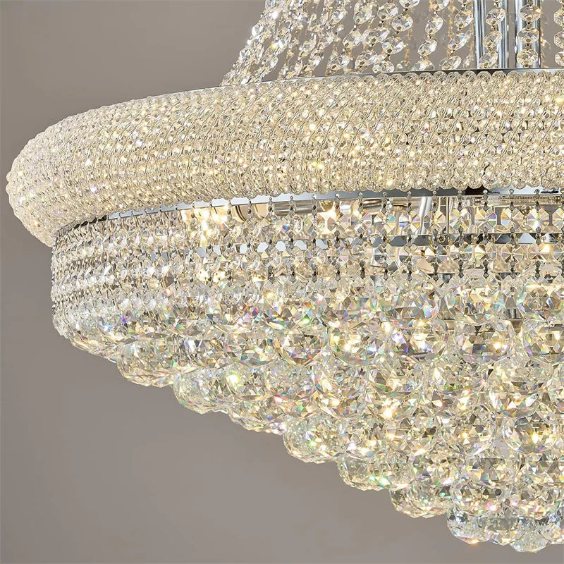 Close-up of a crystal chandelier with a gray background