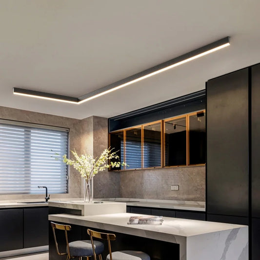 Close-up of the white linear bar ceiling light's sleek aluminum profile.