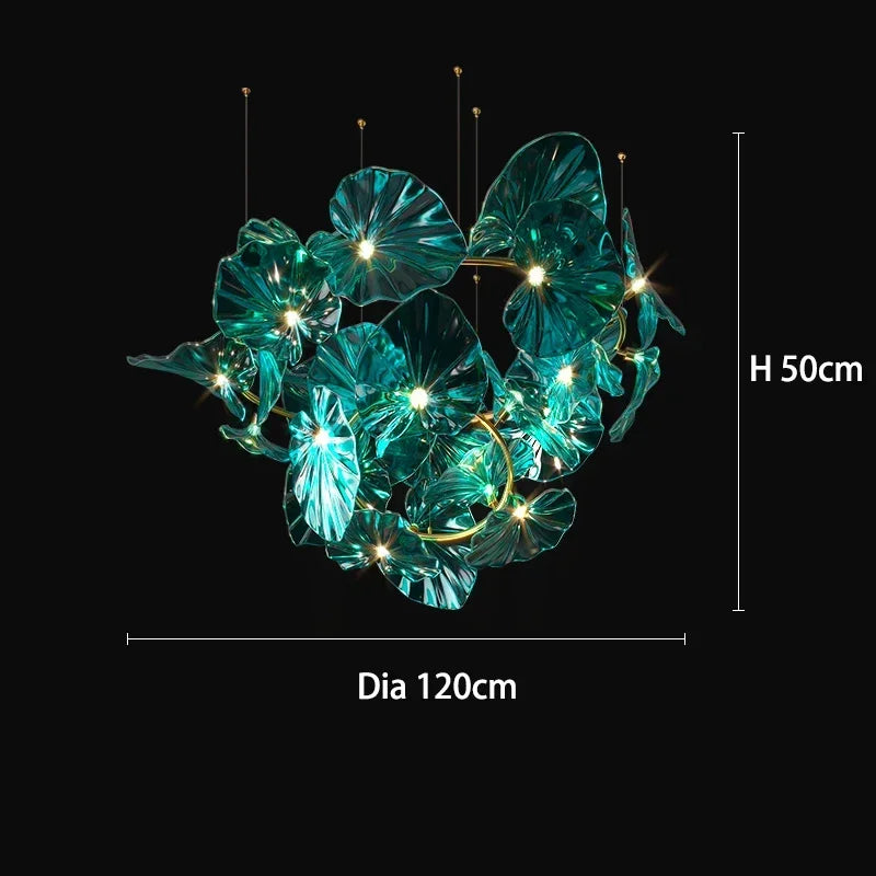 Decorative teal leaf light fixture with dimensions on a black background