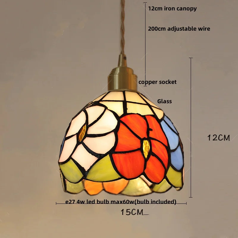 Colorful stained glass pendant light with measurements on a gray background