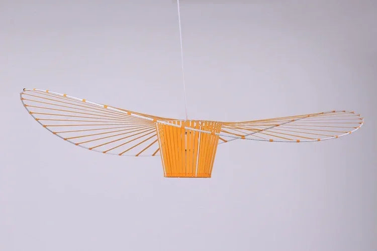 Decorative ceiling light fixture with a geometric design on a plain background