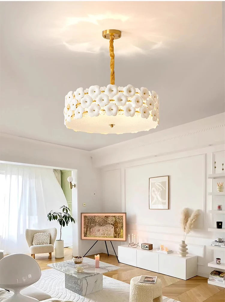 Modern living room with a decorative ceiling light fixture.