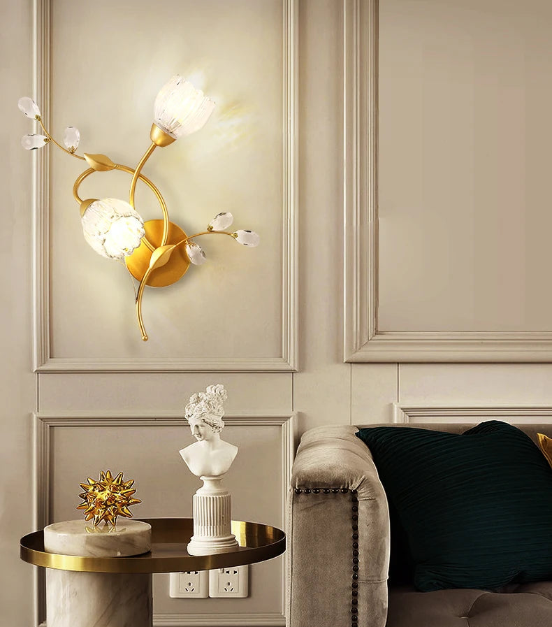 Decorative wall sconce with gold accents in a living room setting.