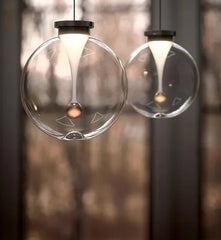 Glass Globe Pendant Light with Brushed Gold Metal Frame Accents