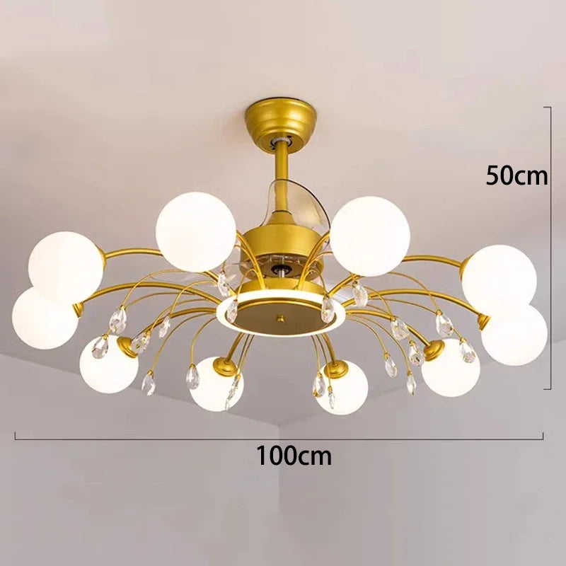 Gold chandelier with white glass shades on a plain background