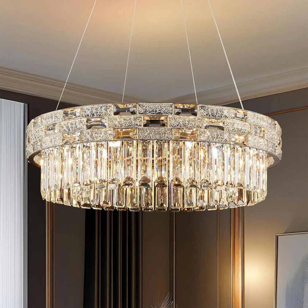 Gold crystal tiered ring chandelier hanging from a ceiling.