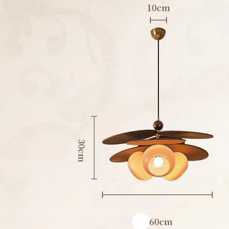 Modern pendant light with dimensions indicated on a beige background
