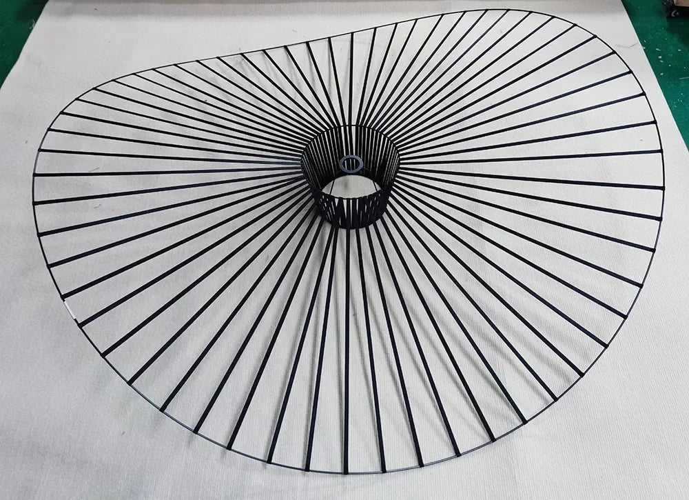 Circular metal grid on a white background
