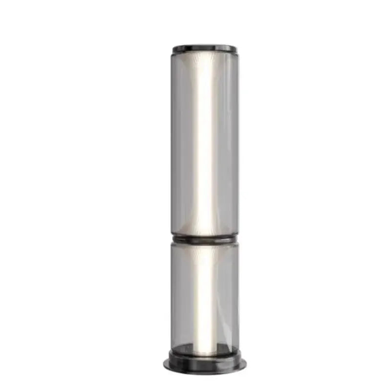 Cylindrical metal filter on a white background
