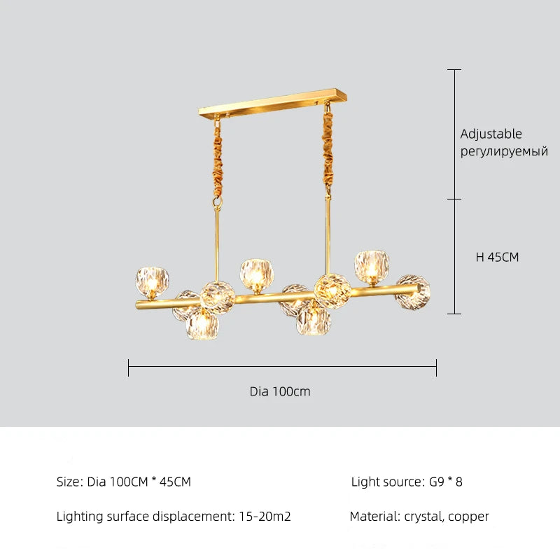 Gold pendant light with crystal elements on a gray background, featuring dimensions and material details.