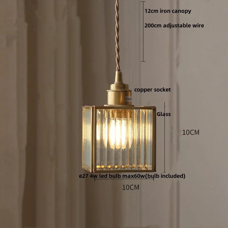 Pendant light with measurements on a plain background