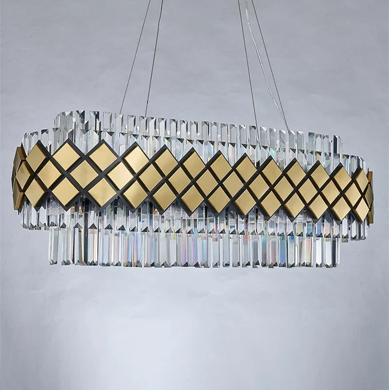 A gold and crystal geometric tiered chandelier displayed against a neutral background.