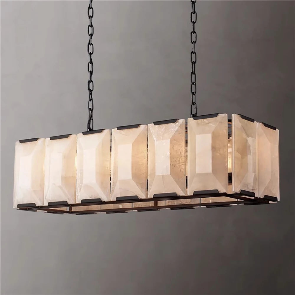 Modern pendant light with geometric design on a gray background