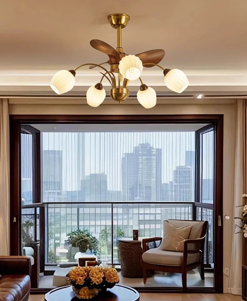 Modern living room with a ceiling light fixture and cityscape view.